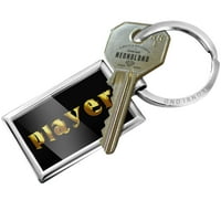 Igrač sa ključem odštampano zlato koje izgleda pismo