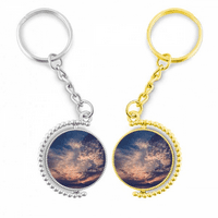 Narančasti tamno plavi nebo oblaci rotirajući rotirajuće ključeve prstena za ključeve